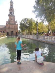 Savannah and Sky checking out the fish in the canal around Plaza de Espana